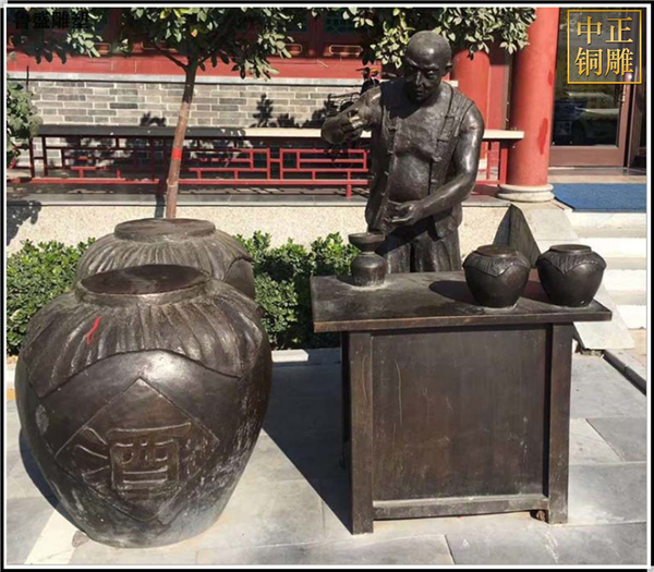 古代賣(mài)酒人物銅雕塑.jpg