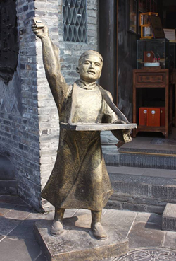 賣(mài)貨郎情景小品雕塑批發(fā)
